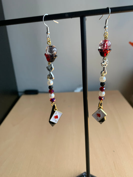 Husk inspired earrings from hazbin hotel